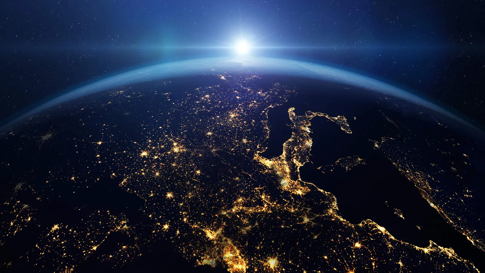 Vue nocturne de la Terre depuis l'espace, lumières des villes visibles
